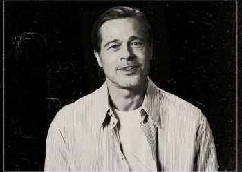 A black and white portrait of a brad Pitt with short hair, wearing a button-up shirt over a t-shirt, smiling against a dark background. The image has a textured overlay with subtle scratches and lines.